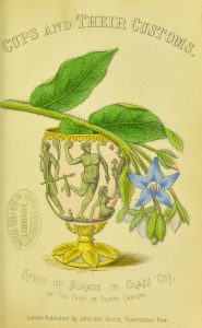 Frontispiece of "Cups and their customs," showing an elaborate white, green, and gold goblet, with a blue flower draped across it